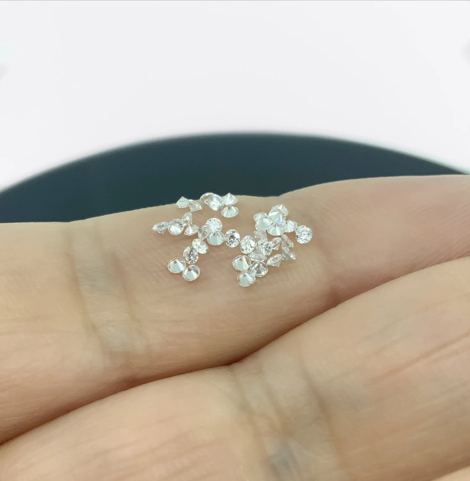 1.5mm CVD Lab Grown Diamond Melee: DEF VS Round Brilliant Cut